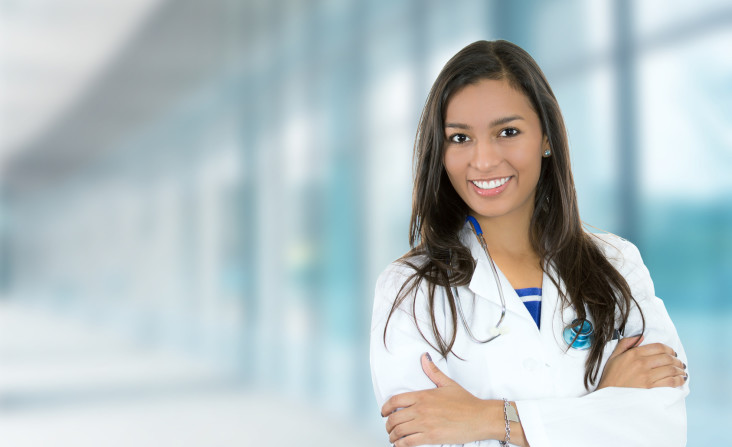 confident young female doctor medical professional in hospital